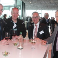 v.r. Roland Huguelet (Evo Bus AG), Nicolas Leuba (Präsident AGVS Sektion VD), Andreas Caillet und Erwin Kaufmann (Evo Bus AG)